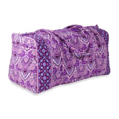 purple quilted handbag