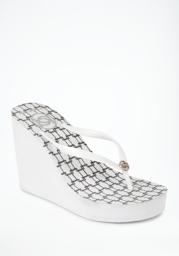 bebe Distressed Links High Flip Flop