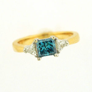 Alluring Blue Diamond Engagement Ring