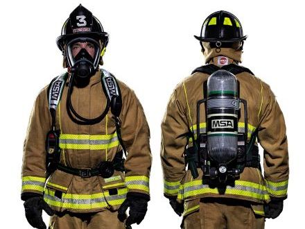 Front and back view of a firefighter wearing an SCBA