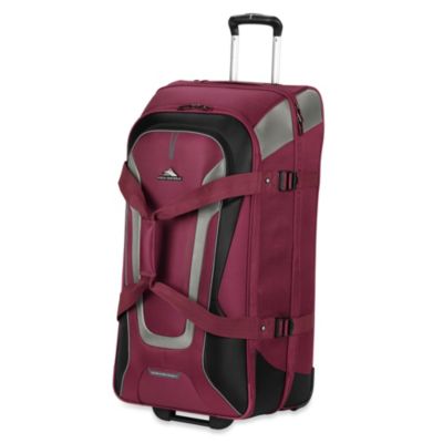 High Sierra AT-7 32-Inch Wheeled Carry-On Duffle with Backpack Straps in Boysenberry - Bed Bath ...