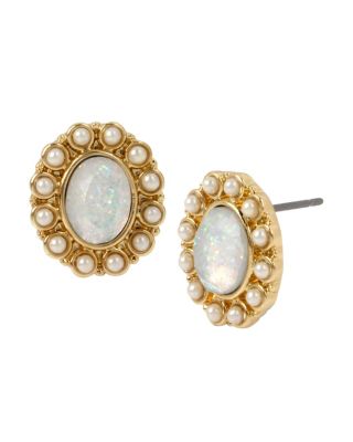 Tiny pearl accents surround a stunning glitter stone on these elegant studs. The gold-tone hardware adds a luxurious, vintage twist to these modern studs. Gold tone glitter stone stud earring with pearl accents Post Back Antique gold tone hardware Metal/glass/acrylic Length: 0.6" Width: 0.5" Pearl: acrylic Pearl size: 2mm