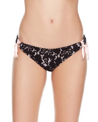These low rise, hipster bottoms sit low on the waist for a sexy look, while a lacey surface and bow embellishments add a flirty touch. Hipster Bottoms Lace Bow embellishments Low rise