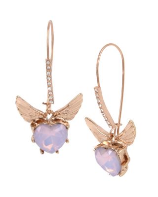 These feminine hook earrings feature a heart-shaped faceted stone in pale lavender. Rose gold wings playfully splay out from this charming set. Rose gold tone long ear wire and heart-shaped stone drop earrings with rose gold tone wings Shepherds hook Metal/glass Length: 2" Width: 1"