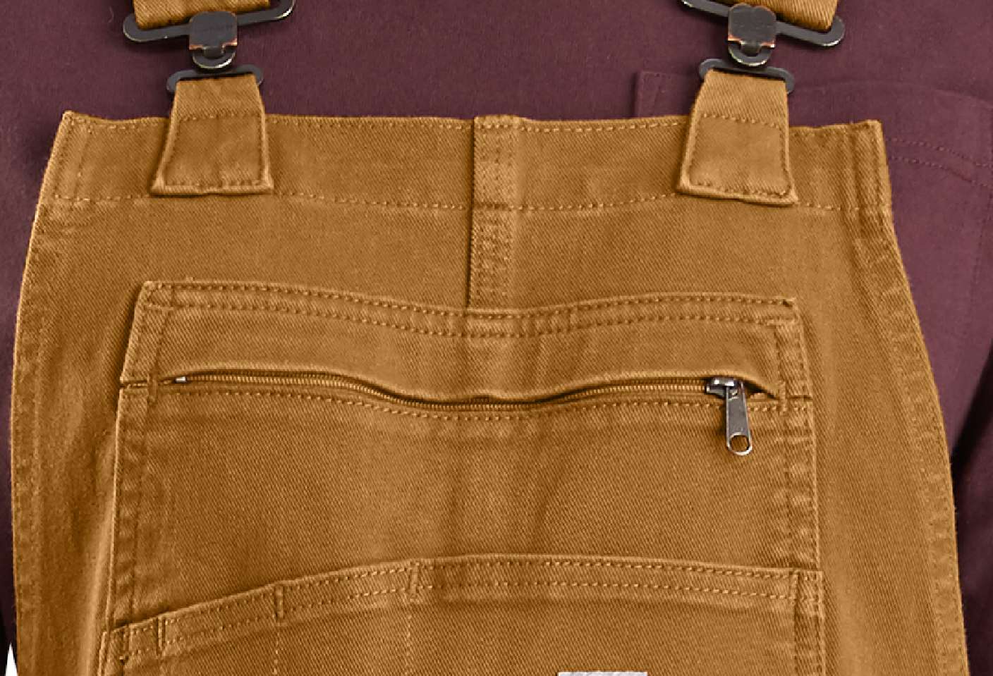 Multi-compartment zip bib pocket.         