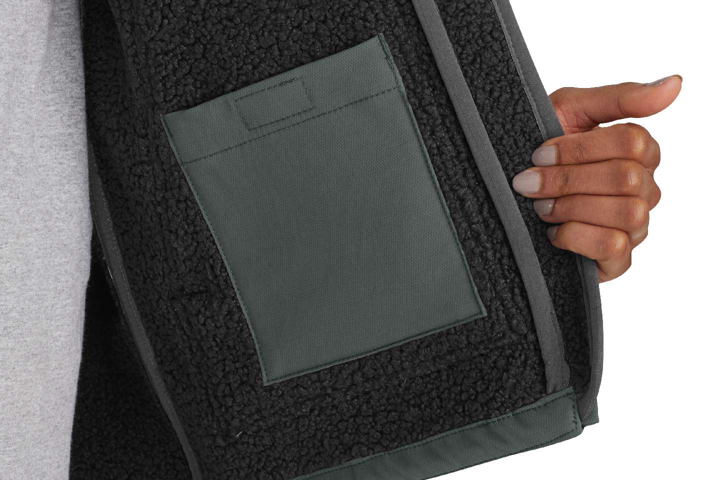 Inner hook-and-loop pocket provides extra storage