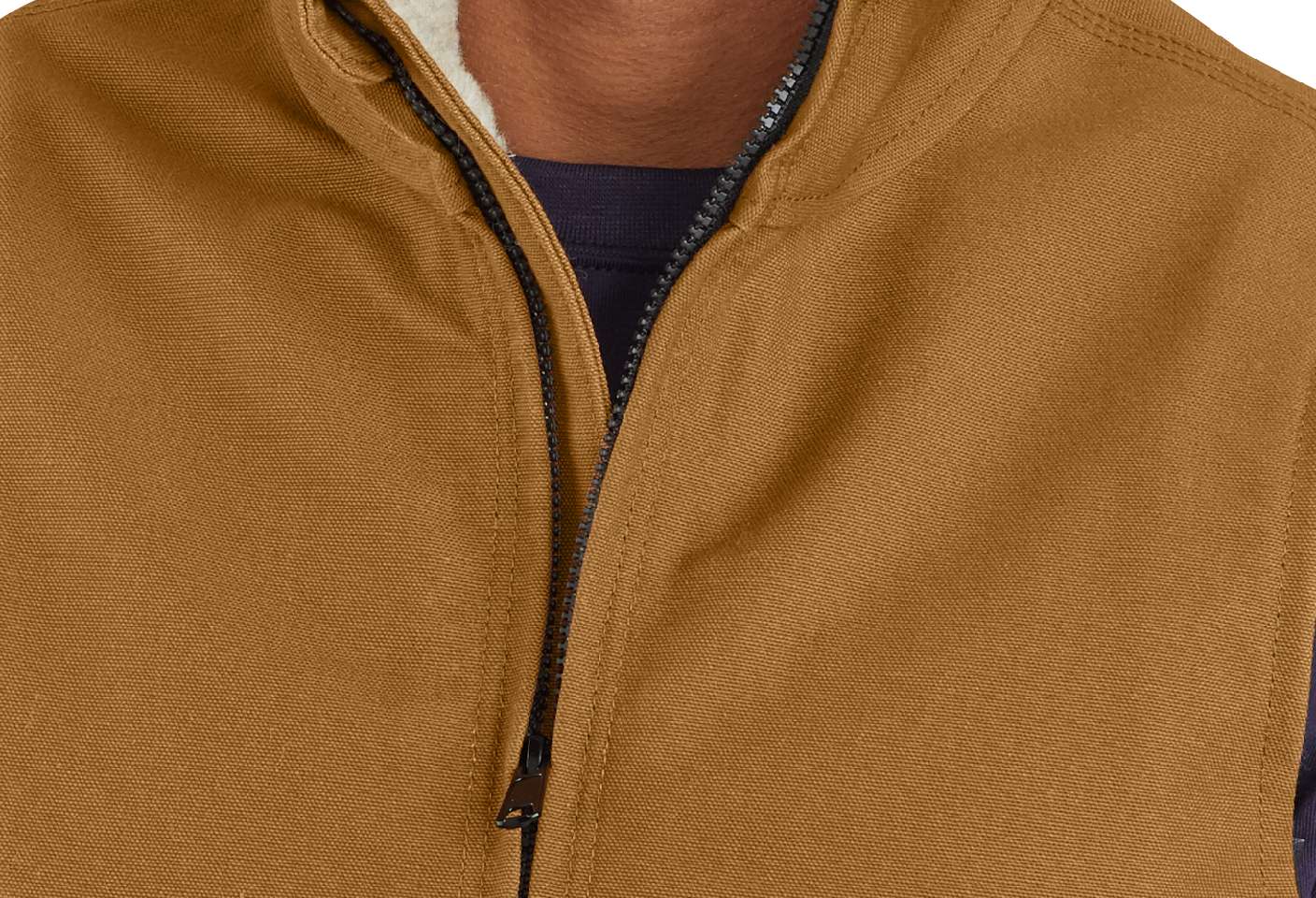 Behind the zipper, an inner storm flap keeps out the cold and wet
