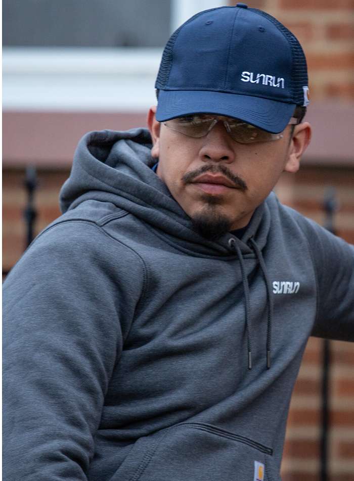 Worker wearing the Carhartt Marquette Sweatshirt.