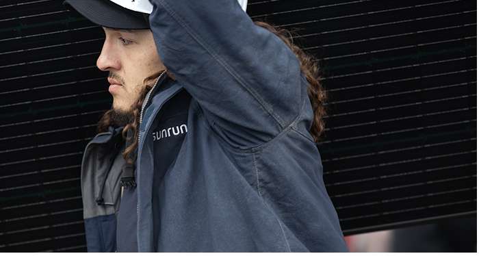 Video thumbnail showing a worker wearing Carhartt gear.