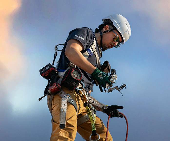 Worker wearing the Carhartt Force Relaxed T-Shirt at a jobsite.