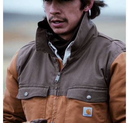 close up of a man wearing Carhartt jacket