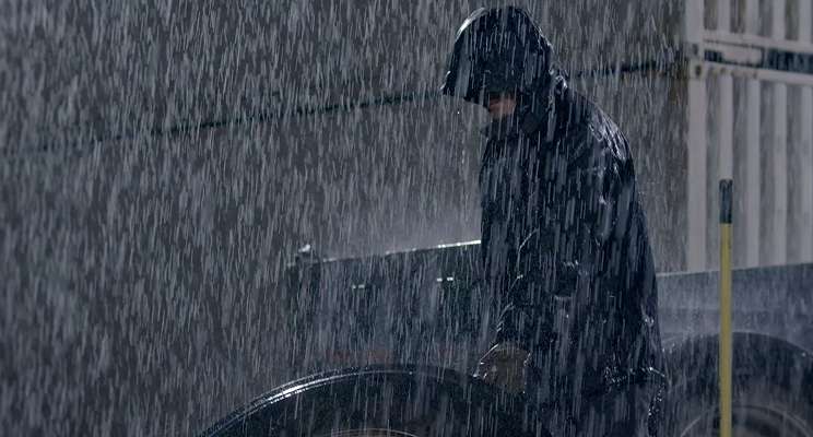 Storm Defender - Person in rain gear