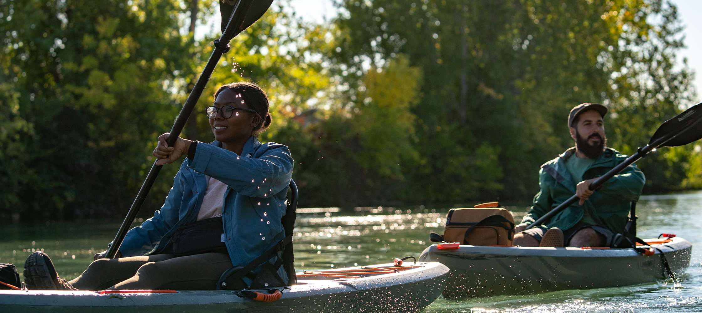 man & woman kayaking