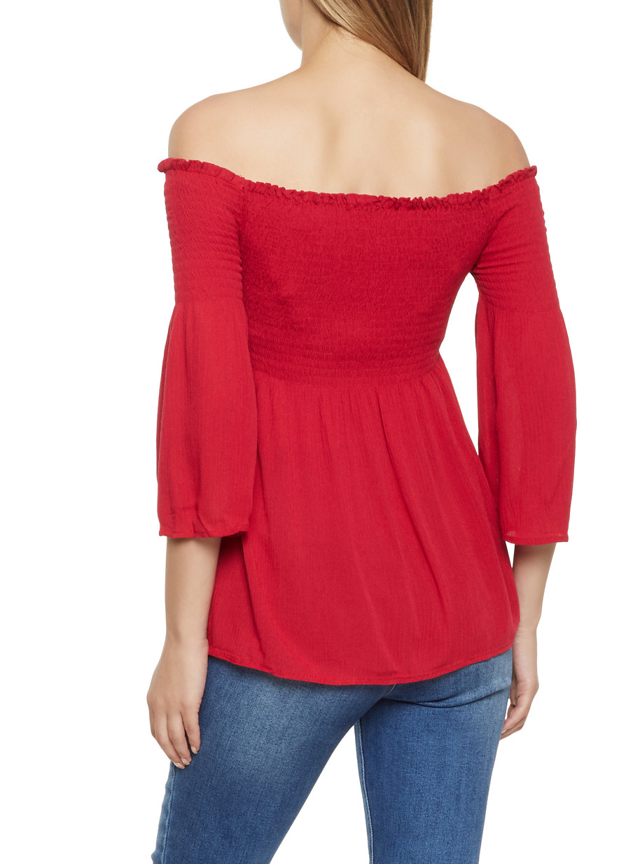 red smocked off the shoulder top