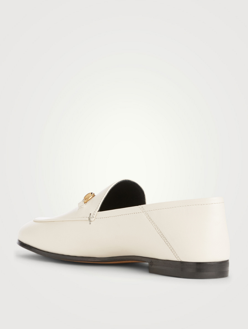white horsebit loafers