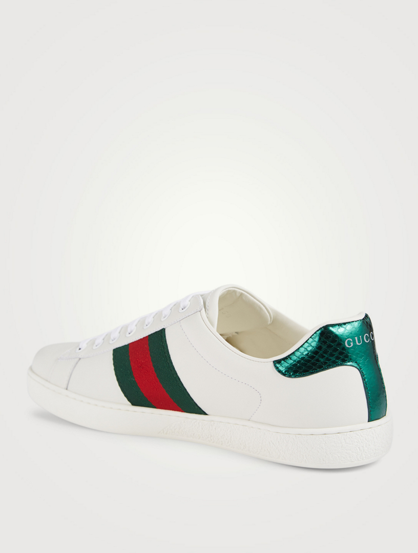 white gucci sneakers with snake