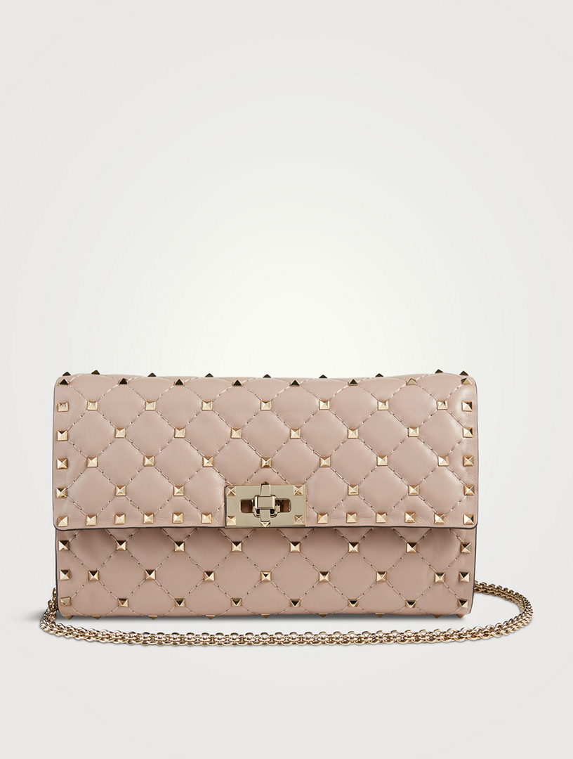 rockstud spike crossbody clutch