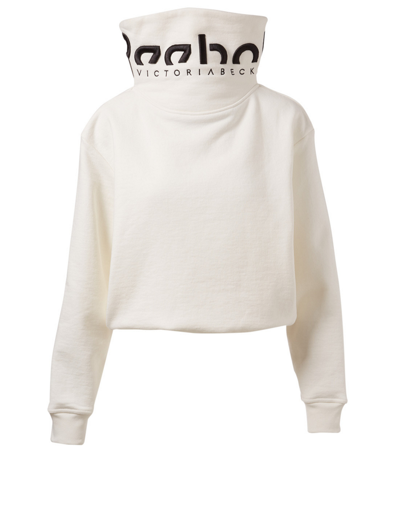 pull reebok femme beige