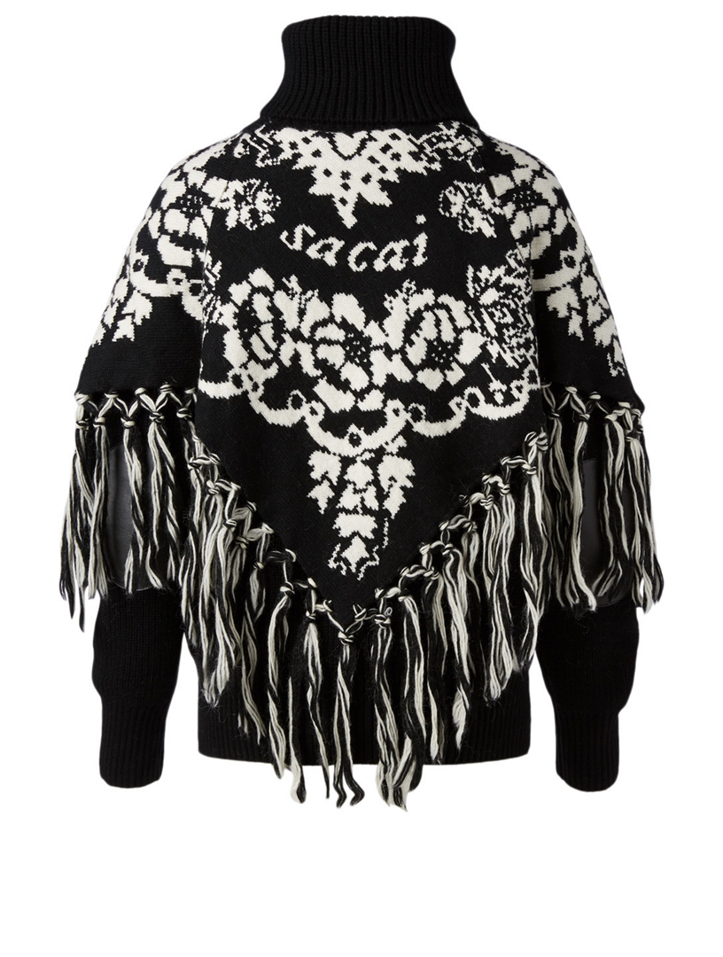 fringe poncho sweater