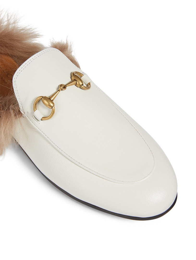 white gucci boots with fur