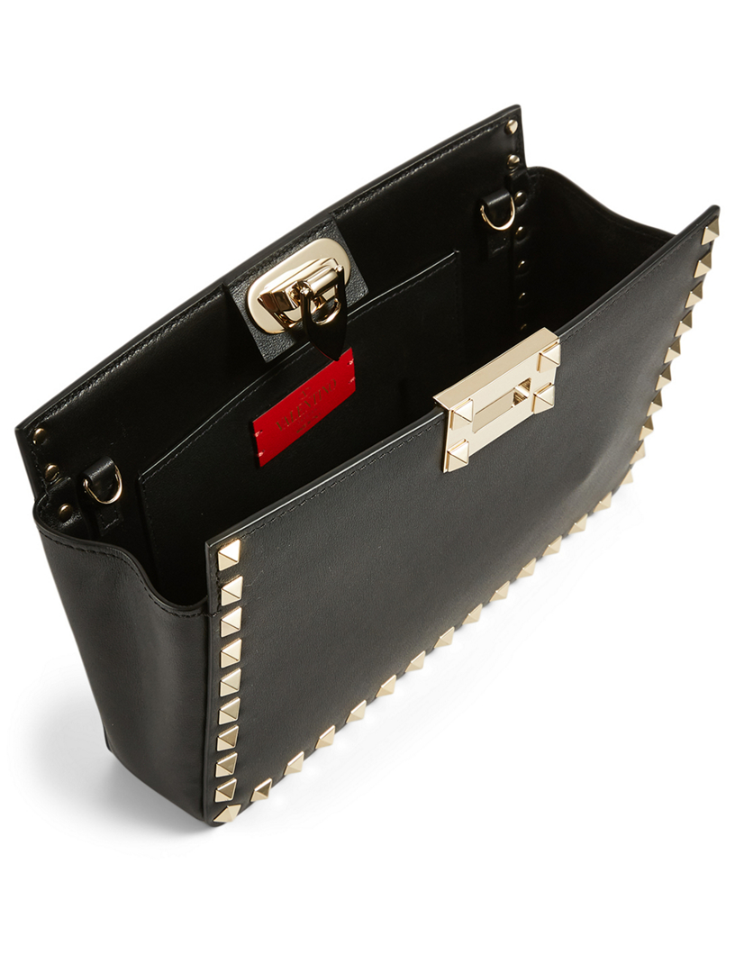 valentino rockstud leather clutch