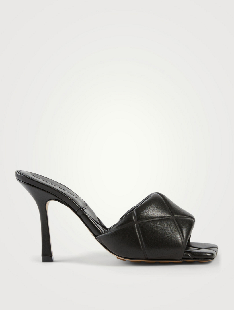 black woven heeled mules