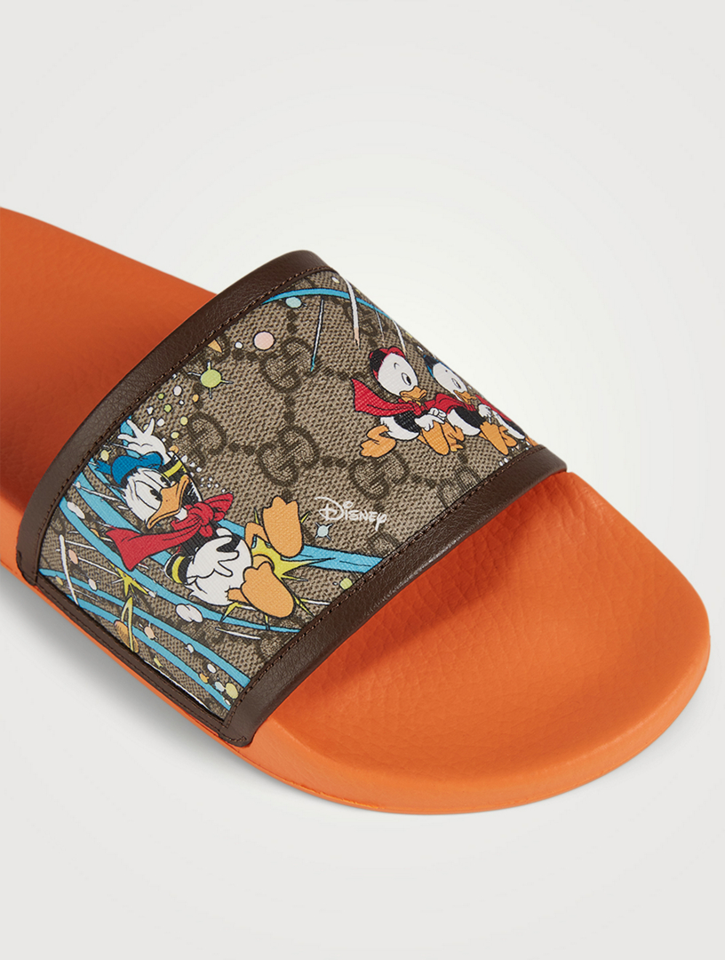 daffy duck gucci slides