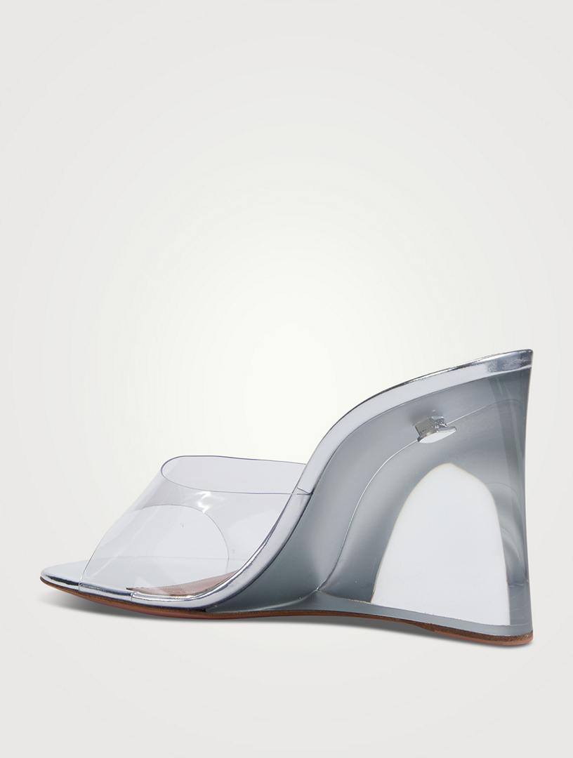 amina muaddi clear wedge