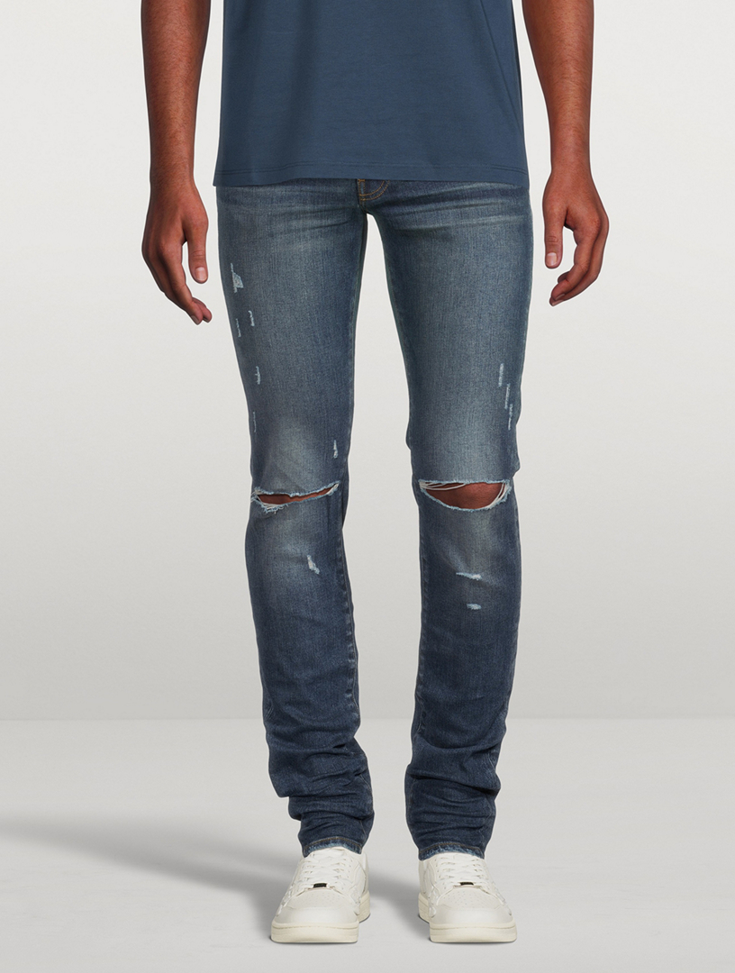 AMIRI Slash Skinny Jeans With Knee Rip Holt Renfrew Canada