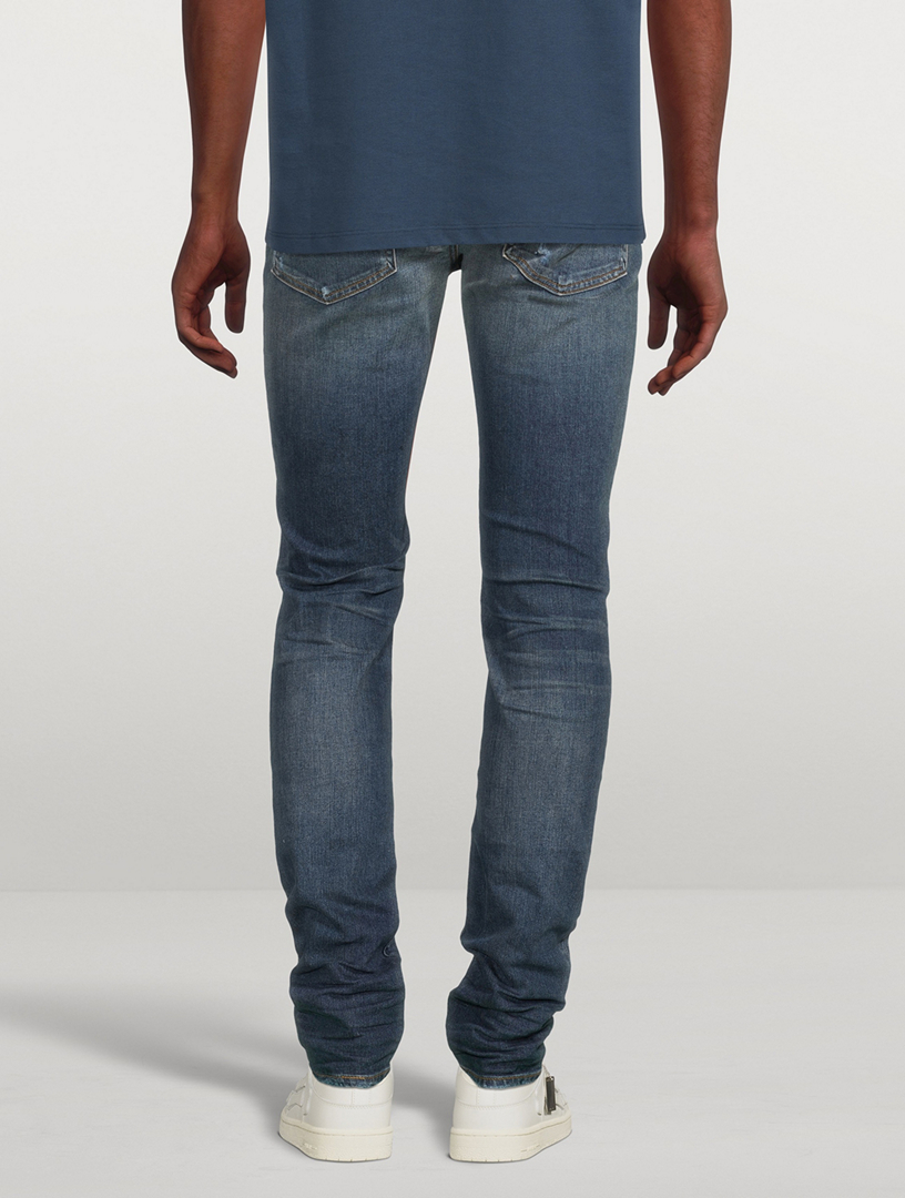 AMIRI Slash Skinny Jeans With Knee Rip Holt Renfrew Canada