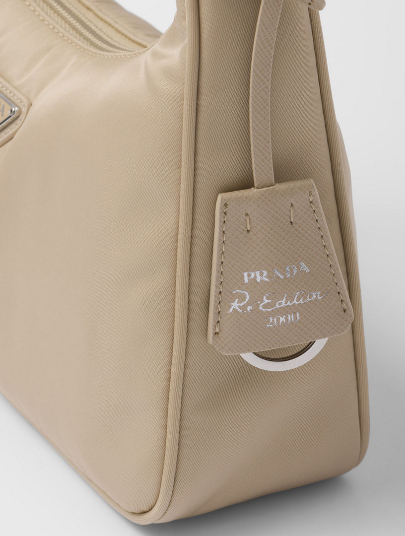 PRADA Re-Nylon ミニバッグ 新作【PRADA】リボン付 パデッドRe-Nylon ミニバッグ (PRADA