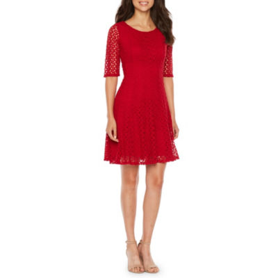 red fit and flare dress with sleeves