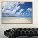 Designart Serene Maldives Beach Under Clouds Canvas Art