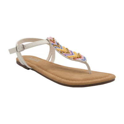 cream colored flat sandals