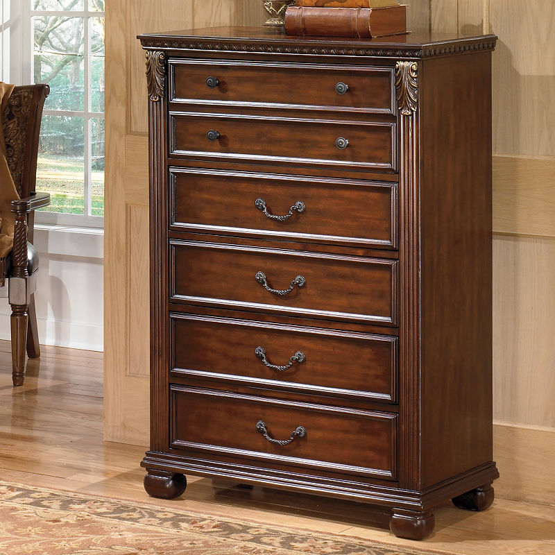 Signature Design by Ashley Leahlyn 5-Drawer Chest in Warm Brown. has hole in back 