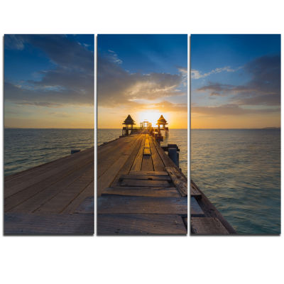 Designart Huge Wooden Pier Into Setting Sun PierSeascape Triptych ...