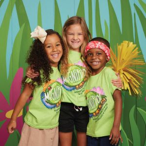 kids in VBS shirts smiling