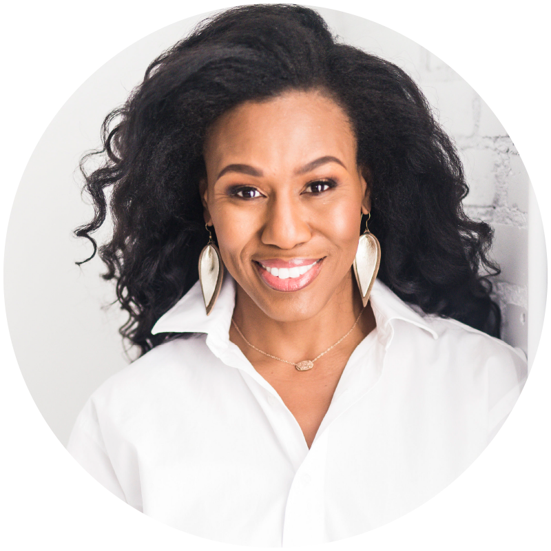 Headshot of a Priscilla Shirer wearing a white collared shirt