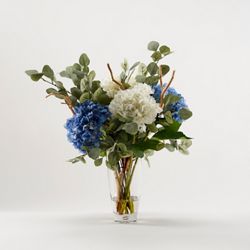 Cream and Blue Hydrangeas with Eucalyptus in Clear Glass Vase