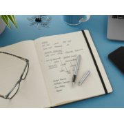 An uncapped Hemisphere rollerball pen laid on top of an opened notebook with writing on the page. image number 3