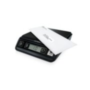 digital postal scale at an angle weighing mail image number 2