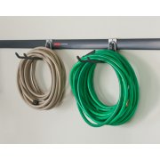 Closeup of Fast Track storage rack and utility hooks with garden hoses on them image number 4