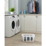 pic of laundry room including laundry basket and step stool image number 6
