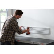 Man installing Fast Track panel on wall image number 5