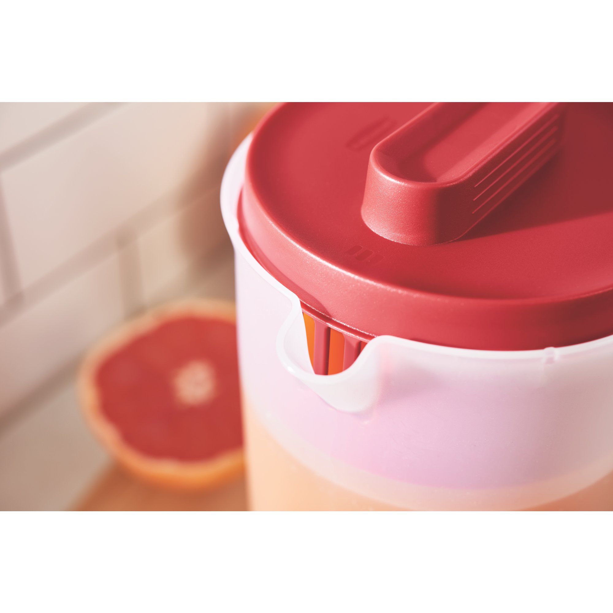 https://s7d9.scene7.com/is/image/NewellRubbermaid/2122587-rubbermaid-food-storage-simply-pour-pitcher-2qt-red-kitchen-with-food-lifestyle-2?wid=2000&hei=2000