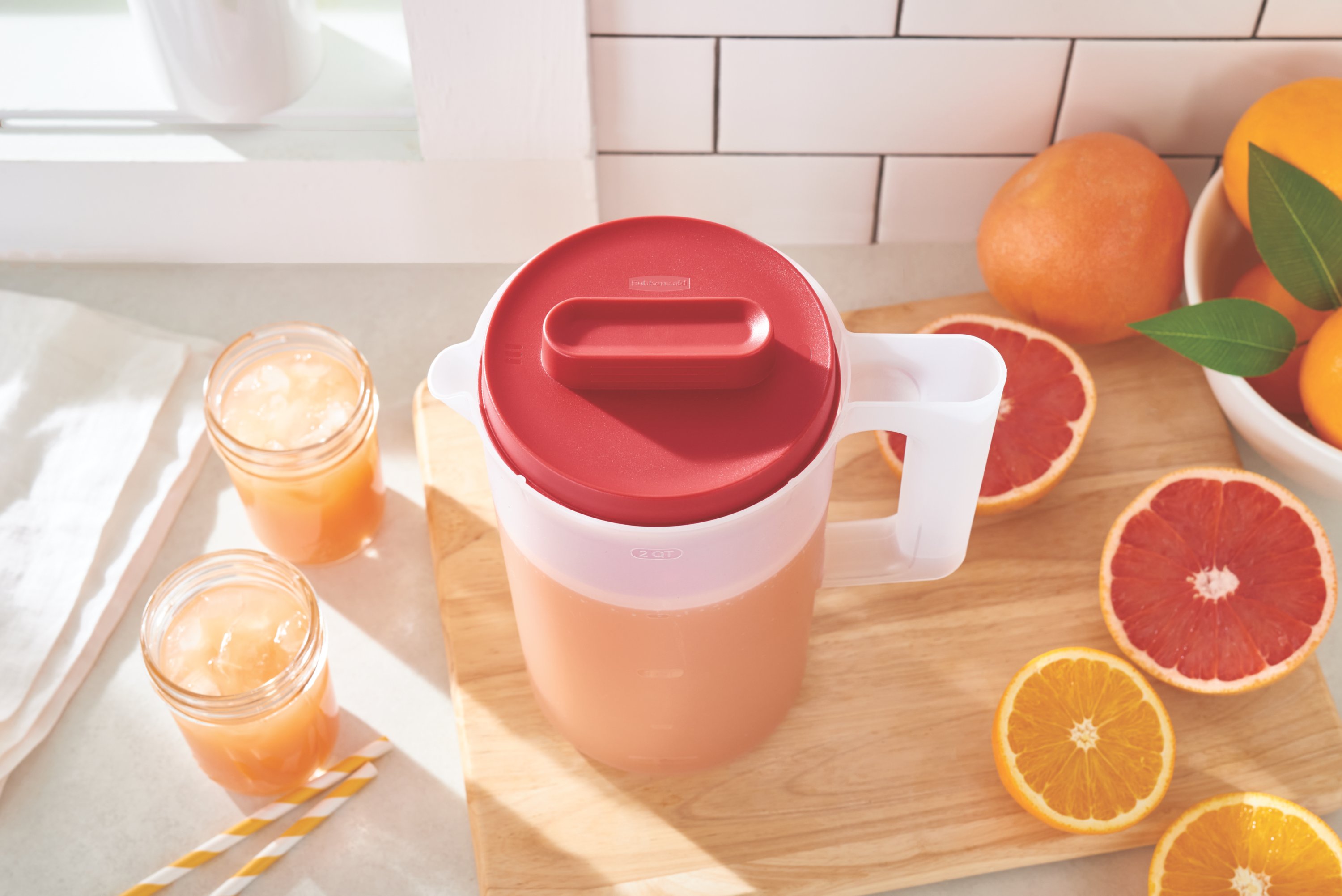 https://s7d9.scene7.com/is/image/NewellRubbermaid/2122587-rubbermaid-food-storage-simply-pour-pitcher-2qt-red-kitchen-with-food-lifestyle-4