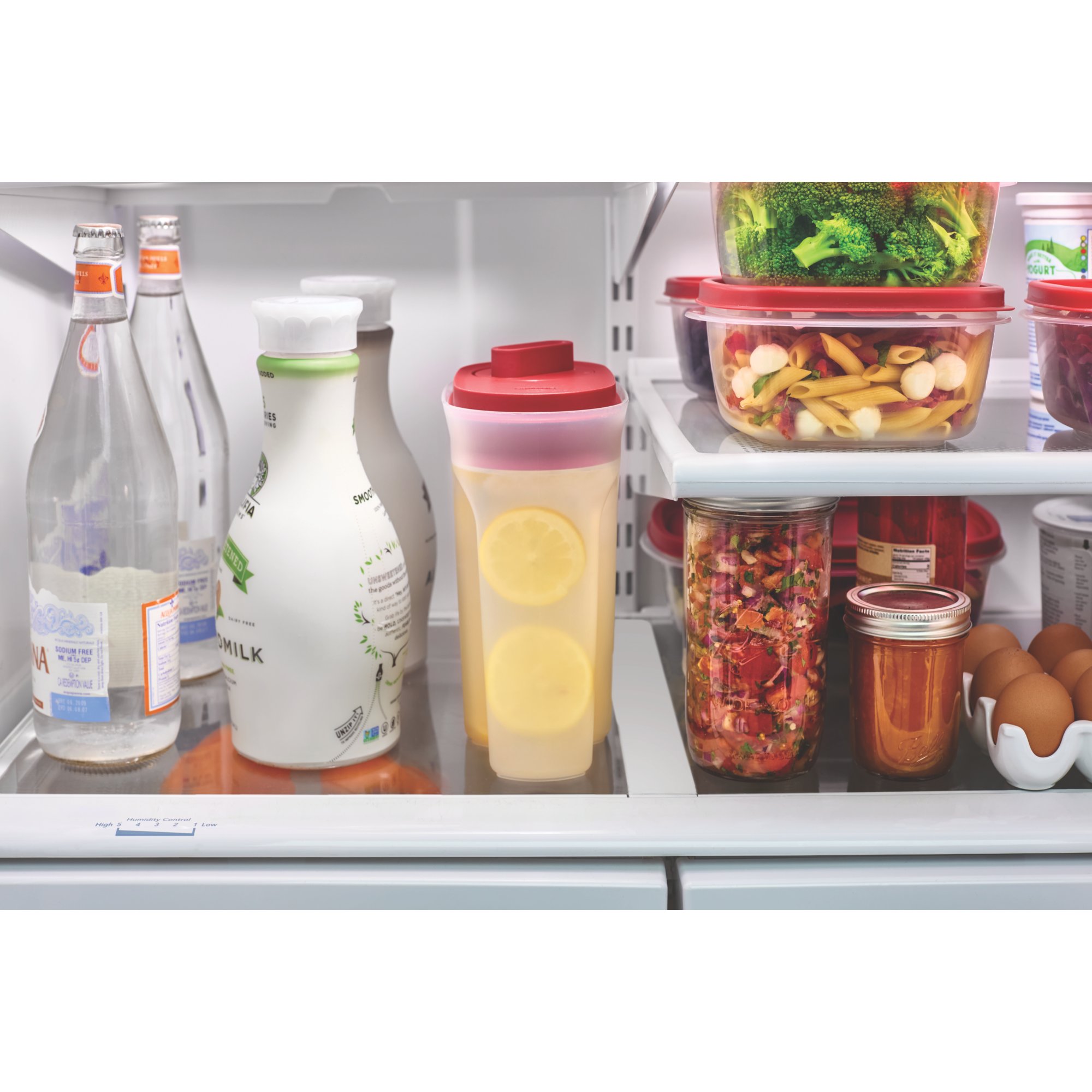 https://s7d9.scene7.com/is/image/NewellRubbermaid/2122589-rubbermaid-food-storage-ss-pitcher-premium-lid-2qt-red-refrigerator-with-food-lifestyle?wid=2000&hei=2000