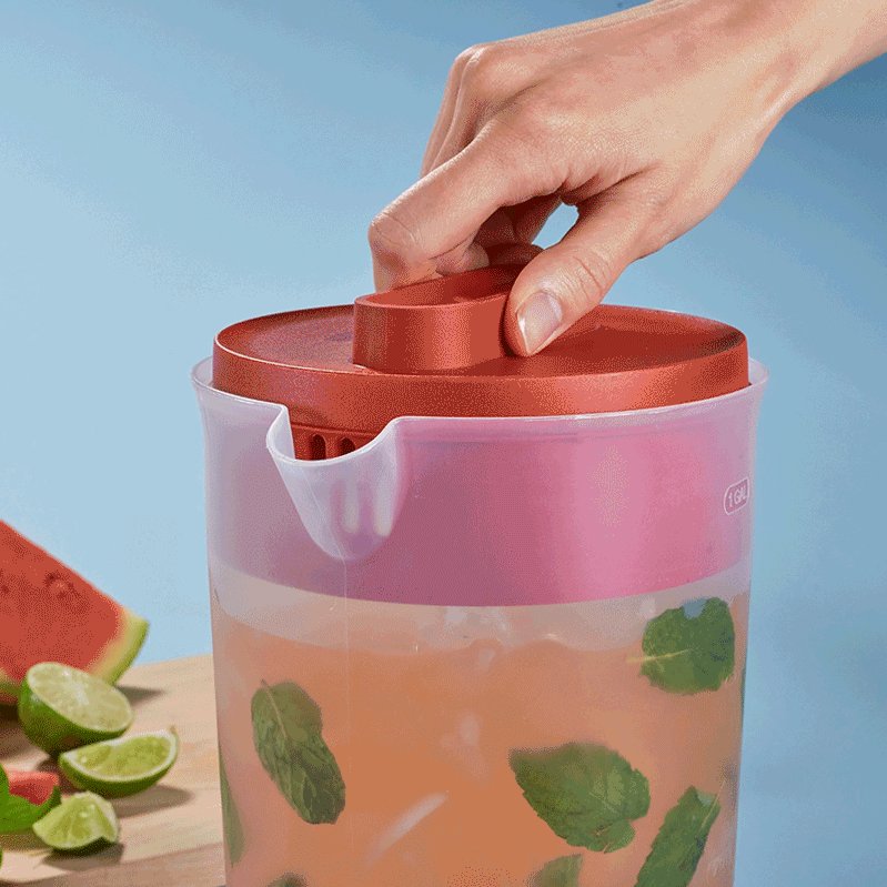 https://s7d9.scene7.com/is/image/NewellRubbermaid/2122601-rubbermaid-food-storage-simply-pour-pitcher-premium-lid-1g-red-with-food-with-talent-lifestyle-2_SQUARE