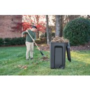 man using outdoor refuse bin for yard work image number 6