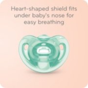 heart shaped shield fits under babies nose for easy breathing image number 6